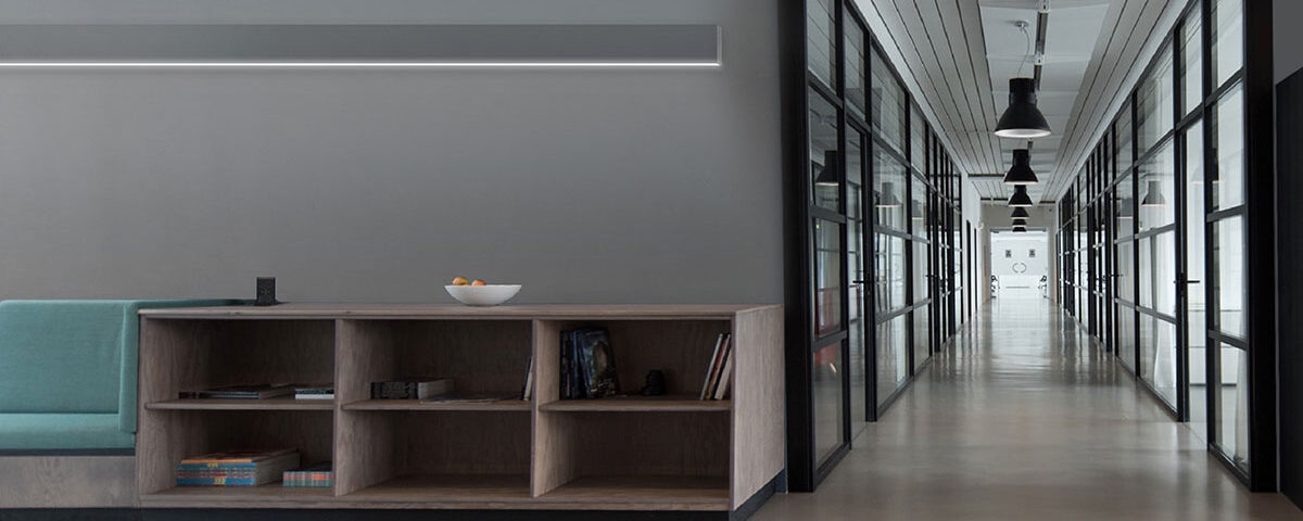 Lumato What Is Wall Wash Lighting? A wall-mounted linear LED fixture washes a wall with light