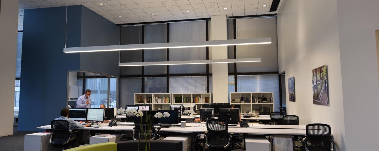What Is Lambertian Distribution? Suspended Lumato linear lighting products in an office space
